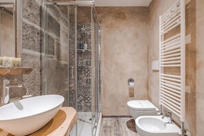 Superior Room | Bathroom | Shower, hair dryer, towels, soap