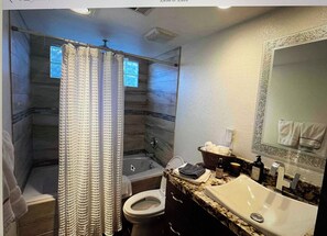 Hair dryer, towels, soap, toilet paper