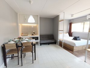 Standard Quadruple Room | Blackout drapes, iron/ironing board, free WiFi, bed sheets - DHIresidence at Impact Muangthong (Pak Kret)