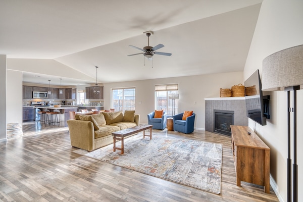 Relax on the sofa or two swivel chairs to enjoy reading by the gas fireplace.