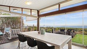 Outdoor dining - Luxury absolute beachfront home (Noraville)