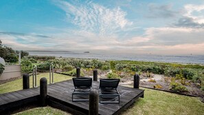 Terrace/patio - Luxury absolute beachfront home (Noraville)