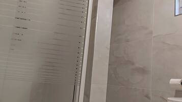 Shower, bidet, towels, soap