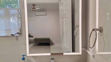 Shower, bidet, towels, soap