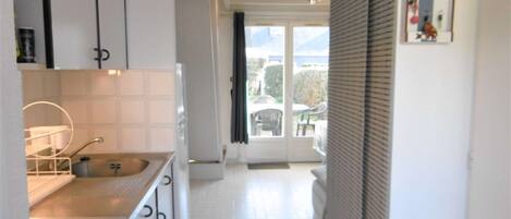Fridge, toaster, cookware/dishes/utensils