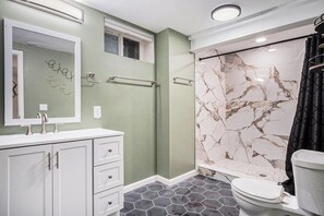Shower, hair dryer, towels, soap -  Modern 4BR Near Downtown, Chef Kitchen, Fenced Yard, EV Charger, W/D (Omaha)