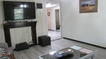 TV, DVD player, books, video library