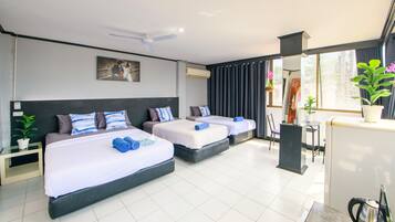 Family Room, Partial Ocean View | Living area | 32-inch Smart TV with cable channels, TV