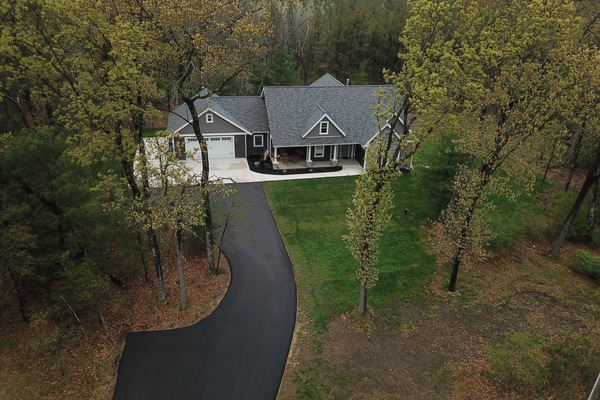 Aerial view of home on 5 acres