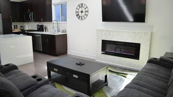 Smart TV, fireplace, books