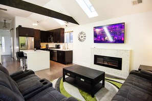 Smart TV, fireplace, books