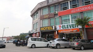 A hotel with a sign indicating it is a 5-star establishment.