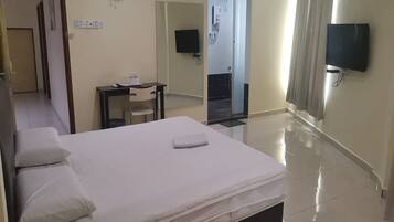Desk, soundproofing, iron/ironing board, bed sheets