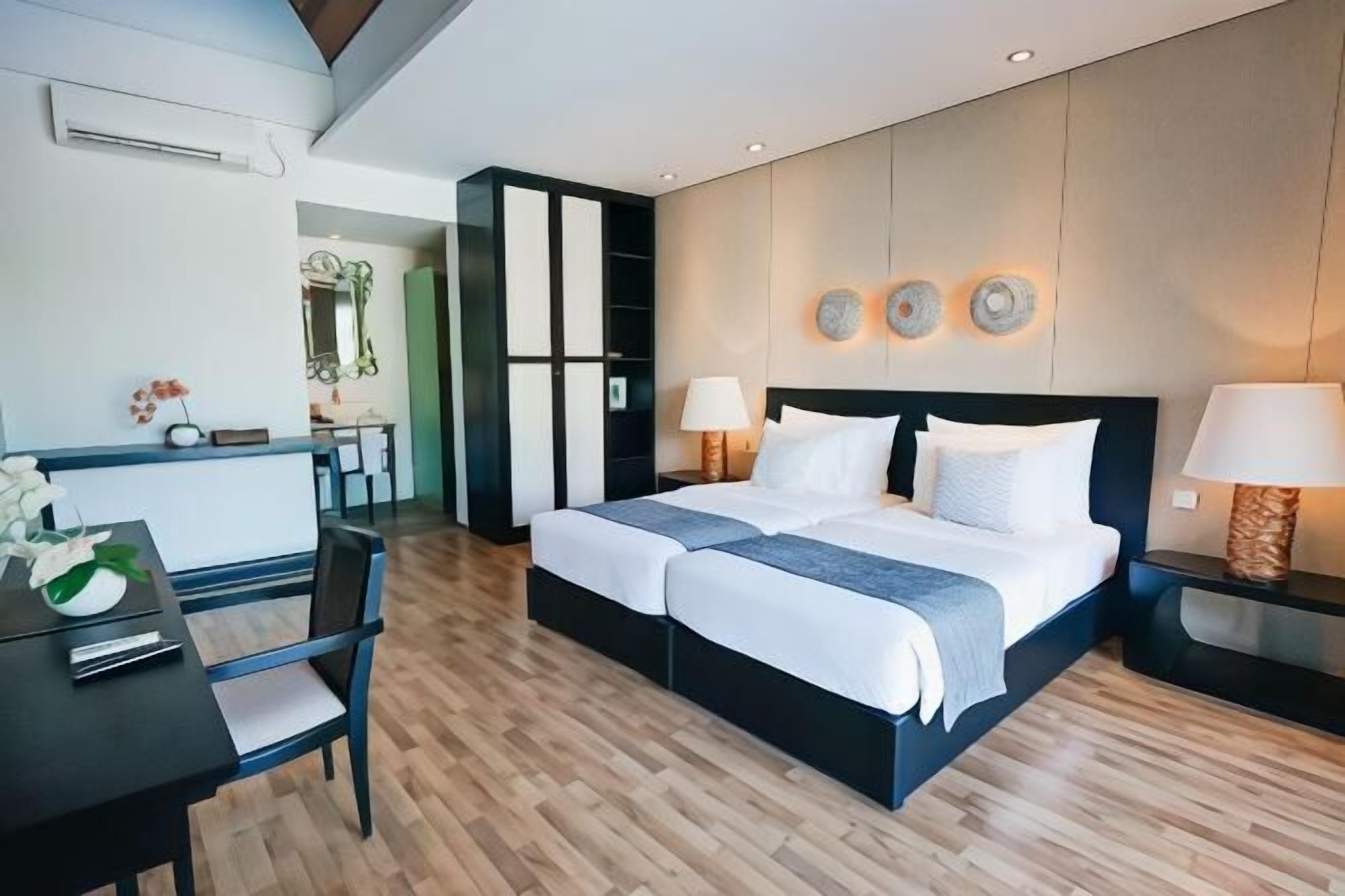 2 kamar tidur, brankas, meja kerja, dan Wi-Fi gratis