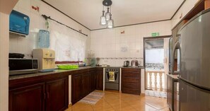 Classic Triple Room | Private kitchen