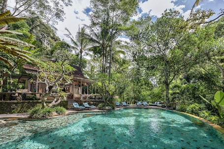 Outdoor pool, pool loungers. Pramana Giri Kusuma