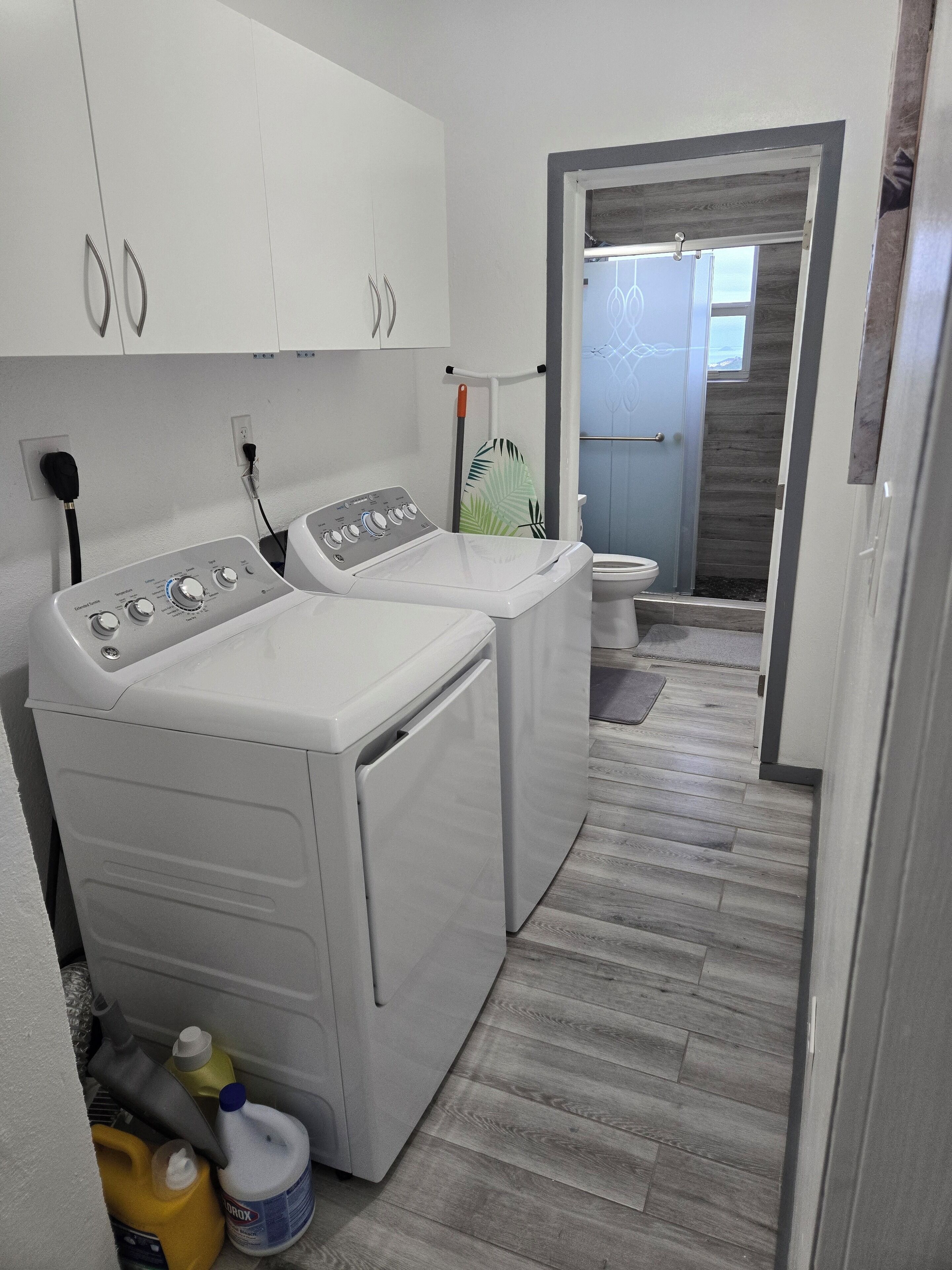 Shower, towels, soap, toilet paper