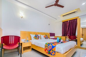 Deluxe Room | Egyptian cotton sheets, premium bedding, in-room safe, desk - Fabexpress Picnic Plaza (Chennai)