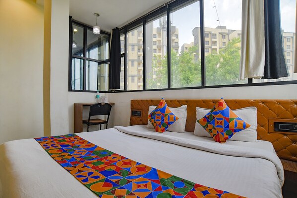 Egyptian cotton sheets, premium bedding, in-room safe, desk - Fabhotel Easy Stay (Bhopal)