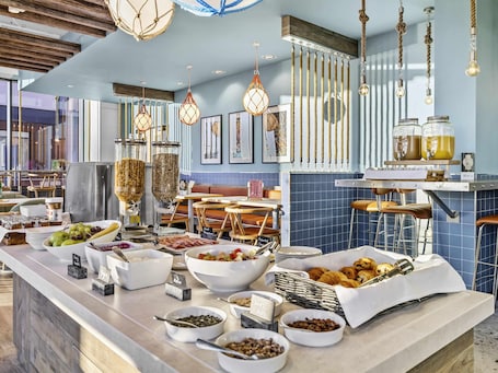 Daily buffet breakfast (GBP 12 per person)