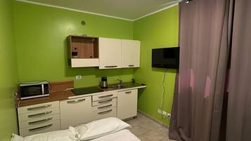 Familienapartment, 1 Schlafzimmer | 1 Schlafzimmer, Daunenbettdecken, kostenloses WLAN