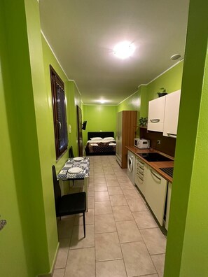 Classic Apartment | Private kitchen | Full-size fridge, microwave, stovetop, electric kettle - Residence Politecnico Bovisa (Milan)