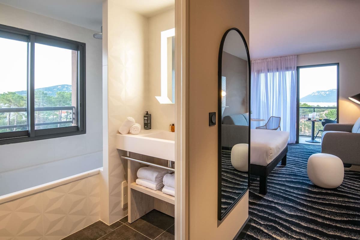 Family Room, 1 Queen Bed with Sofa bed, Balcony, Sea View | Premium bedding, in-room safe, laptop workspace, blackout drapes