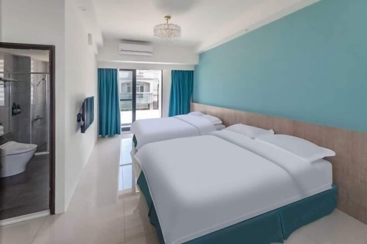 Premium bedding, down comforters, desk, laptop workspace