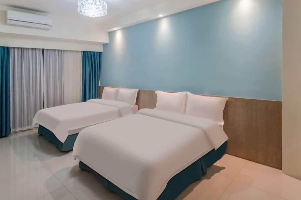 Premium bedding, down comforters, desk, laptop workspace