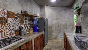 Fridge, stovetop, coffee/tea maker, cookware/dishes/utensils