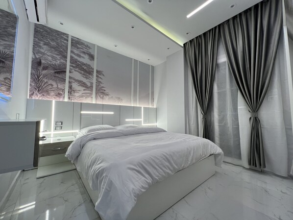 1 غرفة نوم ومكواة/لوح كي وواي فاي مجانًا وملاءات أسرّة