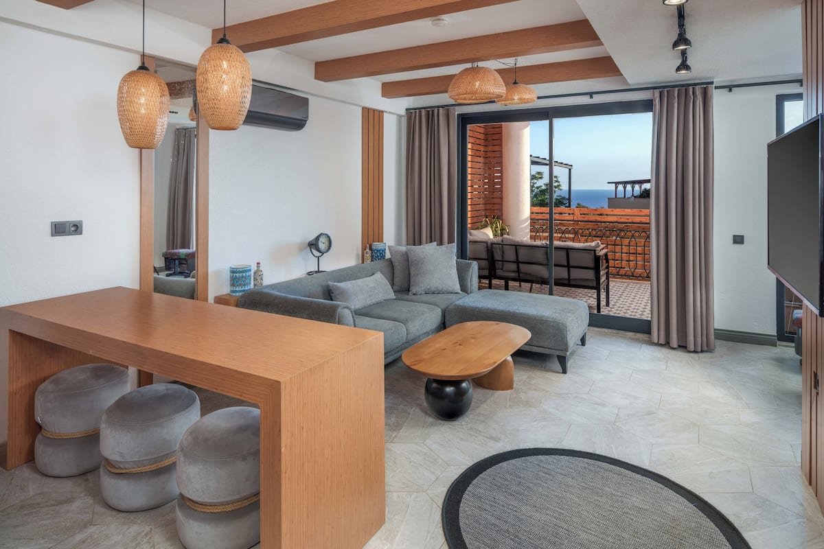 Comfort Suite, 1 Bedroom, Balcony, Partial Sea View | 1 bedroom, Egyptian cotton sheets, premium bedding, down duvets