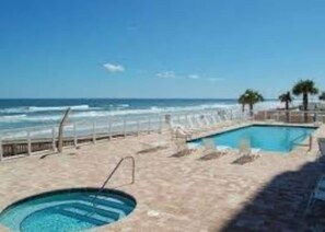 A heated pool - This 8th-floor 3BR/3BA beachfront condo in Daytona Beach Shores offers stunning ocean views. Steps from the Atlantic Ocean, enjoy the beach, pool, or jacuzzi, then watch sunsets over the Intracoastal and downtown from your private balcony. (Daytona Beach Shores)