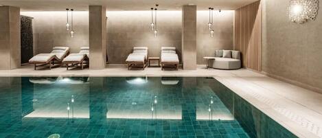 Indoor pool, outdoor pool, pool umbrellas, pool loungers