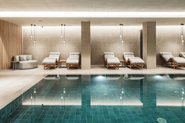 Indoor pool, outdoor pool, pool umbrellas, pool loungers