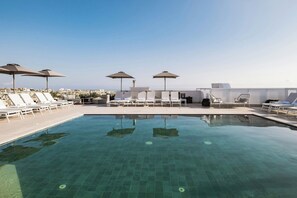 Indoor pool, outdoor pool, pool umbrellas, sun loungers - AC Hotel By Marriott St. Julian's (St. Julian's)