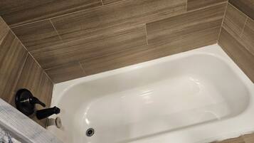 Hair dryer, towels, shampoo, toilet paper