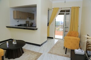 Standard Apartment, 1 King Bed, City View | Living area - Igwe Homes Bukoto (Kampala)