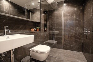 Bathtub, hair dryer, towels
