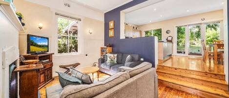 Smart TV, fireplace, DVD player, books