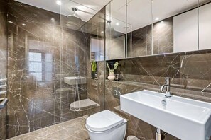Bathtub, hair dryer, towels