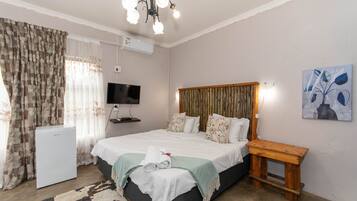 Chambre Familiale, 2 chambres, vue jardin | Literie hypoallergénique, couette en duvet d'oie, minibar