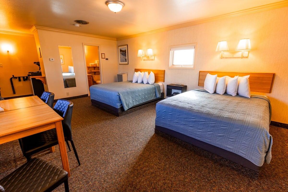 Classic Room, 2 Double Beds | Blackout drapes, iron/ironing board, WiFi (free), bed sheets