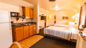Economy Studio, 2 Double Beds | 1 bedroom, blackout curtains, iron/ironing board, free WiFi
