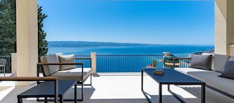 New! Villa Atopos with heated private pool, 5 bedrooms, Cinema room, panoramic sea views