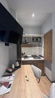 Family con cucina | Minibar, in-room safe, soundproofing, cribs/infant beds
