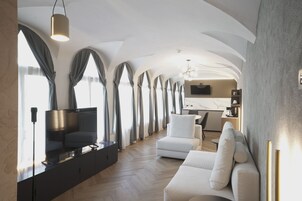 Presidential Suite | Living area | 55-inch LCD TV with satellite channels, TV