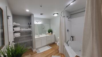 Jetted tub, hair dryer, towels, soap