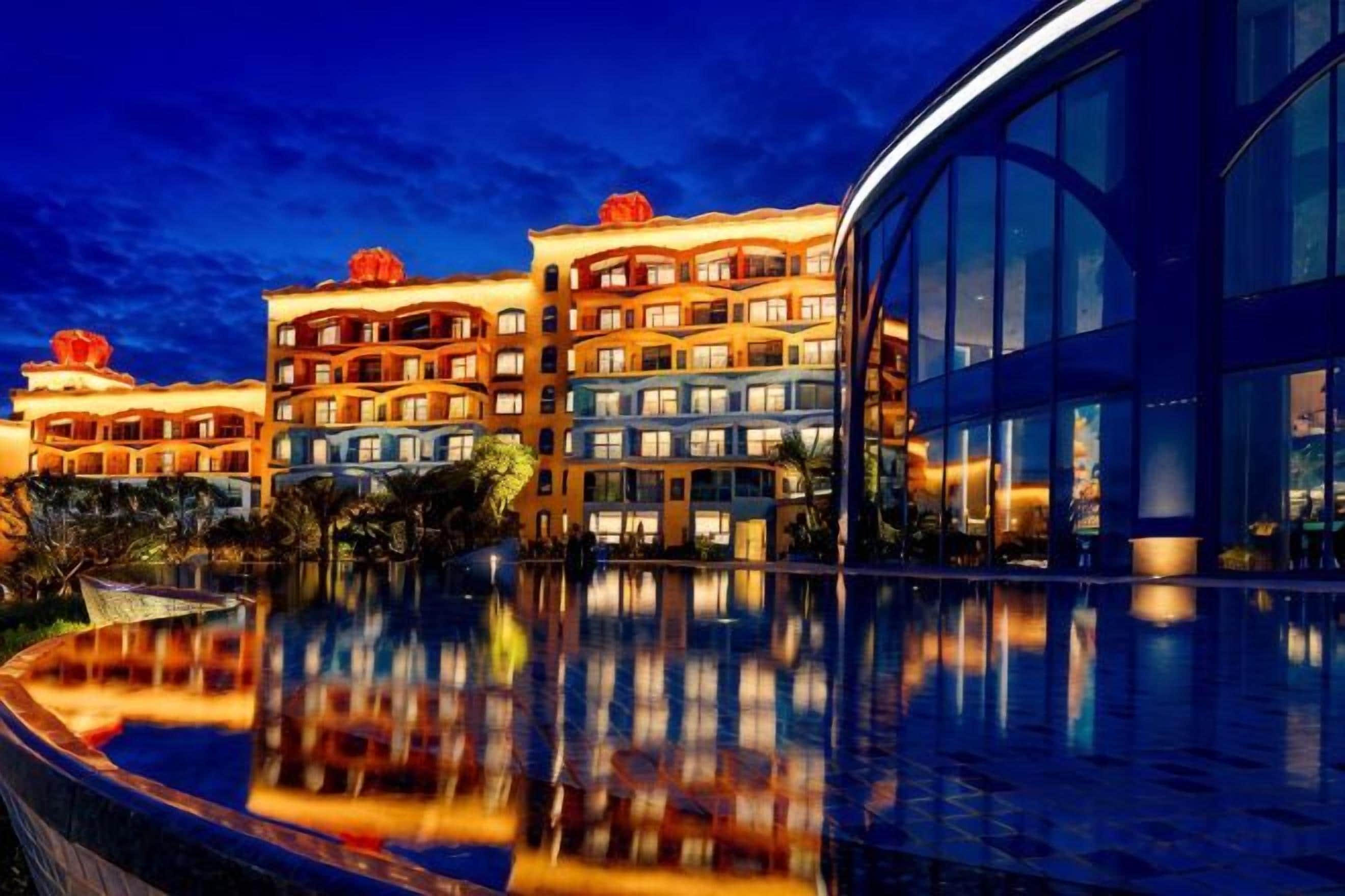 A hotel with multiple floors, a swimming pool, and a modern building with large windows.