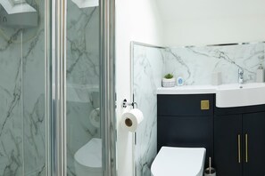 Bañera, secador de pelo